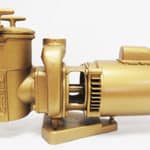 A gold pump on a white background.